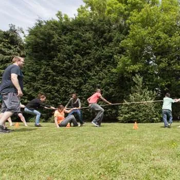 Group of People Playing Tug of War