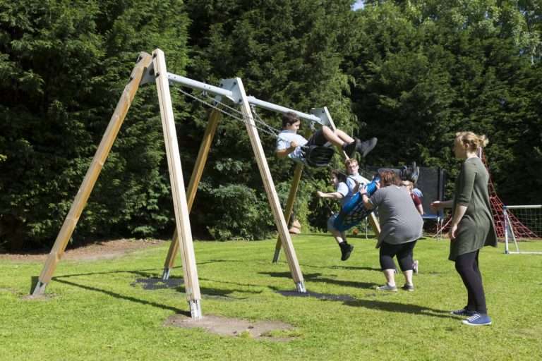Children Playing on Swing set