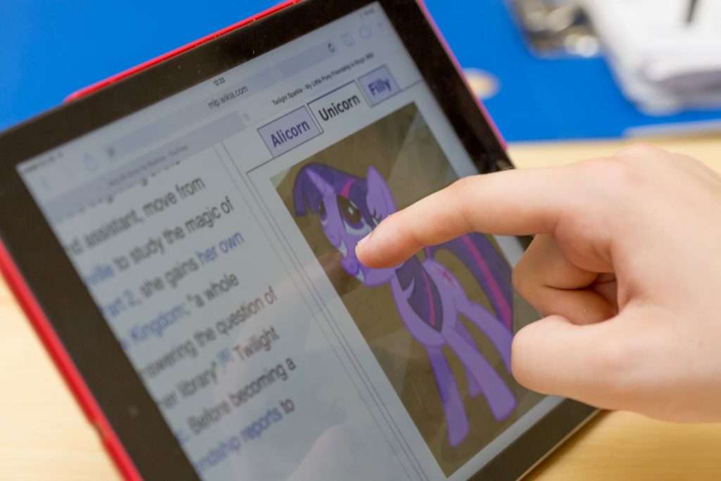 Child Learning On A Tablet