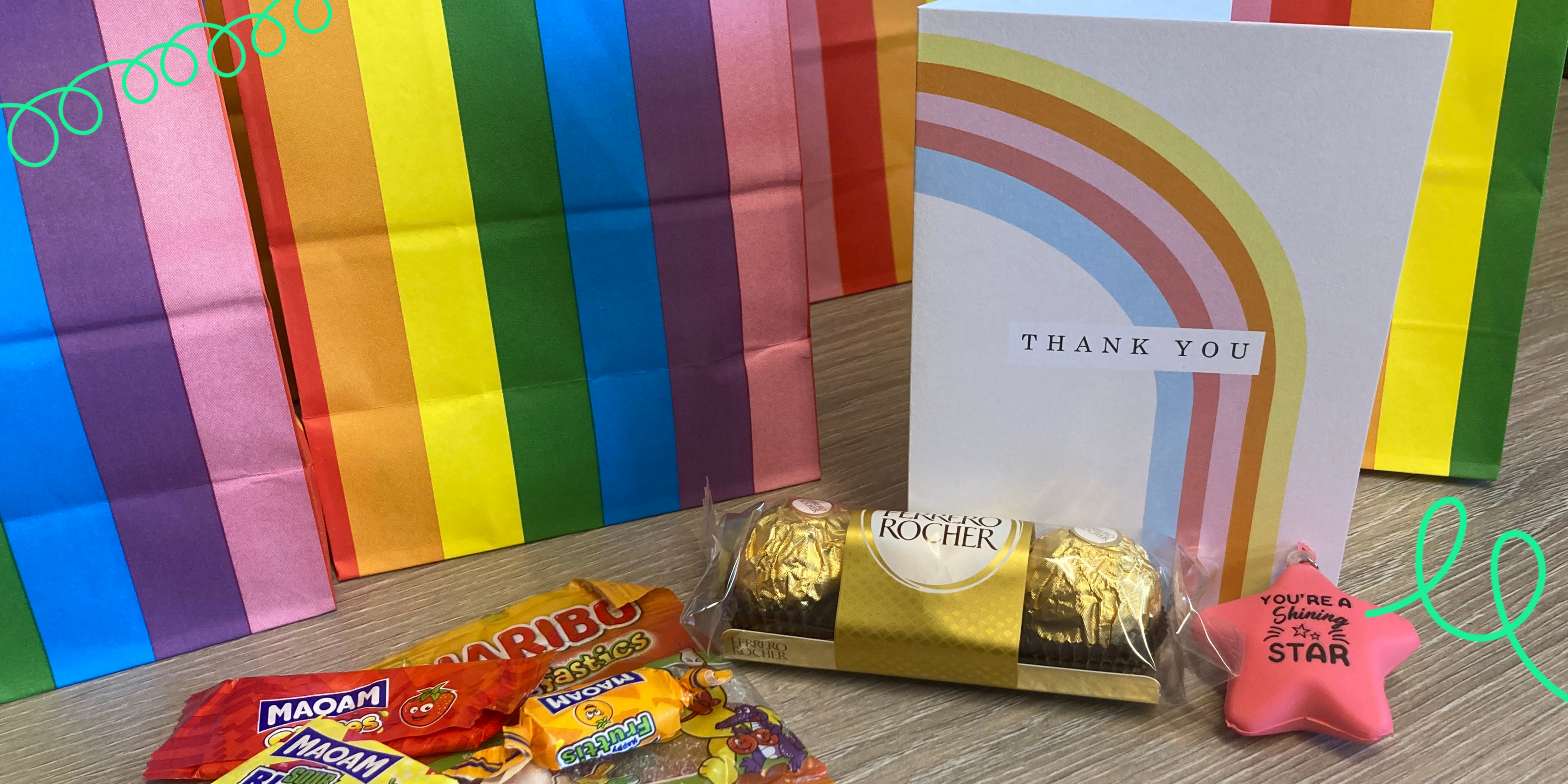 A display of thank you cards and gifts